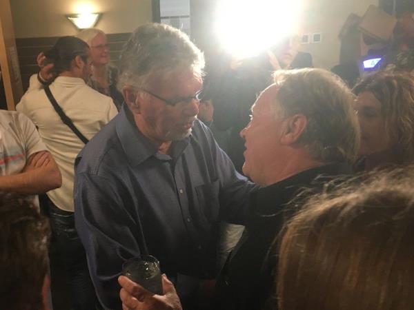 Kamloops mayor-elect Reid Hamer-Jackson (right) is co<em></em>ngratulated by incumbent councillor Dieter Dudy on B.C. municipal elections night last October. Hamer-Jackson has since become embroiled in a battle with city councillors.