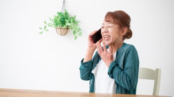 senior woman talking on phone and smiling