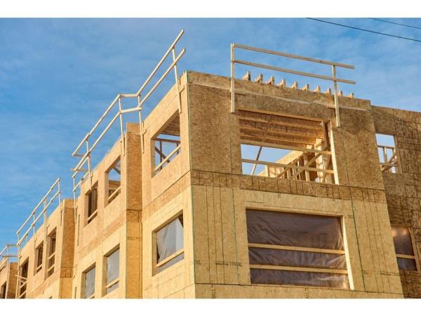 A residential building under co<em></em>nstruction in Ottawa, Ontario, Canada, on Wednesday, March 8, 2023. The Canadian housing market has seen an abrupt reversal from its frenzied pandemic days as the central bank started raising interest rates last year to combat inflation.