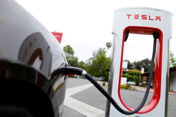 A Tesla super charger is shown at one of the company's charging stations in San Juan Capistrano, California,