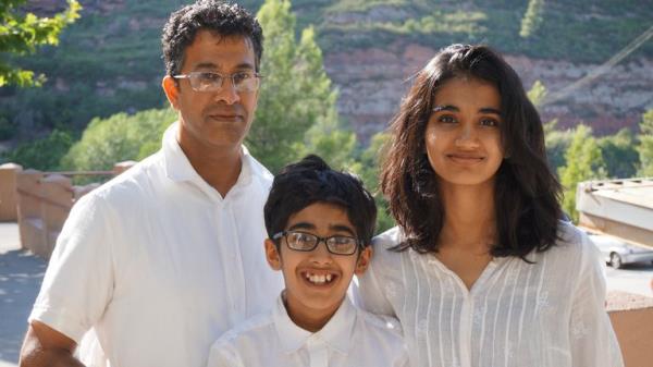 Rohan Godhania (centre) with his parents Pushpa and Hitendra Godhania in Barcelona in 2015     